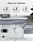 Anker charging station powering six devices with USB and AC ports